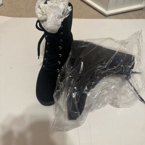 Black Lace-Up Boots. Stuart weitzman Henley bootie